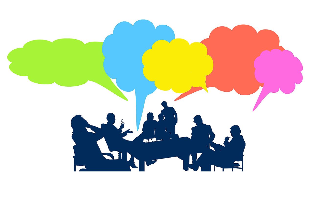 Simple graphic showing group discussions with multicolored text balloons
